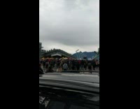 Woman with banner poster photo shoot street protest