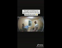 Ring security camera of couple playfighting