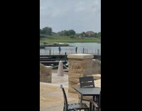 Guy blue tank top dance on bridge