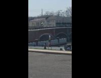 Shirtless Guy Films Workout Video with Handstand
