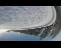 GoPro falls off snowboarders helmet and rolls down slope