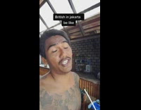 Shirtless guy mocking british accent in Jakarta
