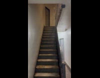 Rain water leak inside apartment building stairs