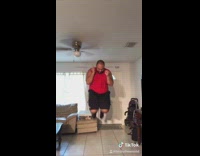 Guy dances to pop song in living room, smacks ceiling fan and knocks it down