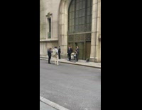 Band wearing suits posing for camera