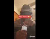 Guy spills water and vacuums the television 