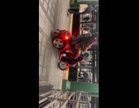 Collab Subway Creatures - Guy by platform on red mobility scooter