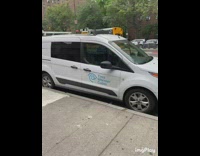 White van is a fake Time Warner Cable service car 