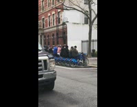 Line of People Bike in Place Together 
