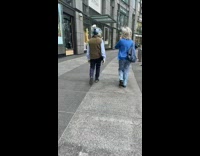 Old Man Wears Round Glass Helmet as Mask 