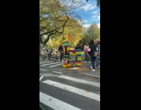 Collab WINY - Person in extended piñata costume at street