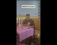 Guy uses finger to get remaining drink 