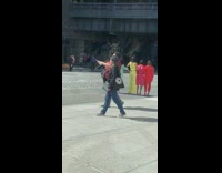 Five girls different color clothes walk street