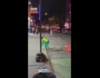 Guy hits boxes on ground with golf club 