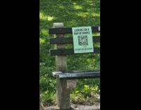 Looking for man sign with QR code