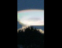Collab DailyDoseOfIntenet - Large white UFO disc light in sky