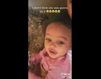 Little girl lets out small scream 