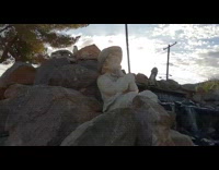 Koi pond water fountain at backyard