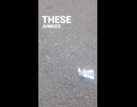 Man shows pokemon packs scattered on street