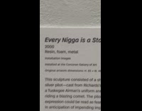 Girl reads every is a star sign art in museum 