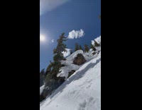 Skier cant stop sliding down mountain after landing