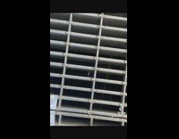 Guy drops keys into sidewalk grate