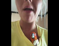 Girl red bird in shirt eat apple 