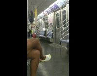 Guy on subway does flips while holding onto rail