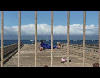 Woman long blue dress keep out wharf