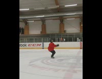 Ice skater does backflip 