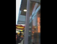 woman at atm with legs on head