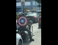 Man Captain America costume rides the motorcycle