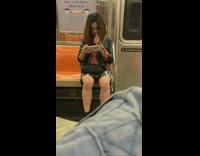 Collab Subway Creatures - woman touching nose watching phone