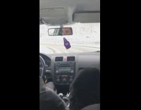 Lady Screams as Car Slides on Curved Road