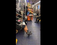 Man selling snacks inside subway train