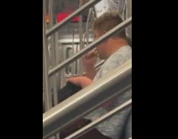 Guy brushes his teeth on train ride 