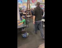 Guy sit and break tower at expo