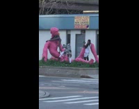 Girl climbs pink sculpture twerks dances motorcycle 