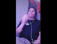 Black shirt girl takes big hit vape 