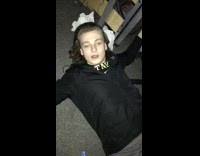 nsfw guy black shirt laying on ground 