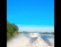 Collab SendItOfficiall - Guy waterskis barefoot white rope boat lake 