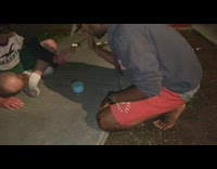 Friends play game guy smashes raw egg 