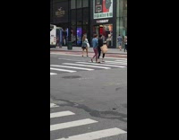 Guy black shorts reveals butt sidewalk hollister 