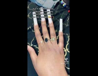 Girl has long acrylic nails like mom 
