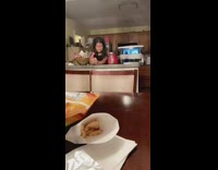 Little girl evil smile kitchen counter 