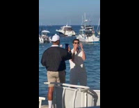 Man music video shoot at the beach