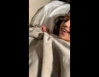 Grey cat mimics girl 