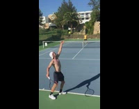 man serves tennis ball hits guy in yellow