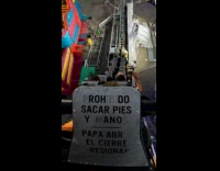 Man uses phone during roller coaster ride