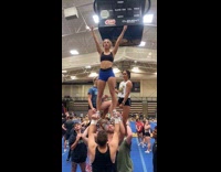Collab ClipsIG - Woman pulls teammate into place on pyramid